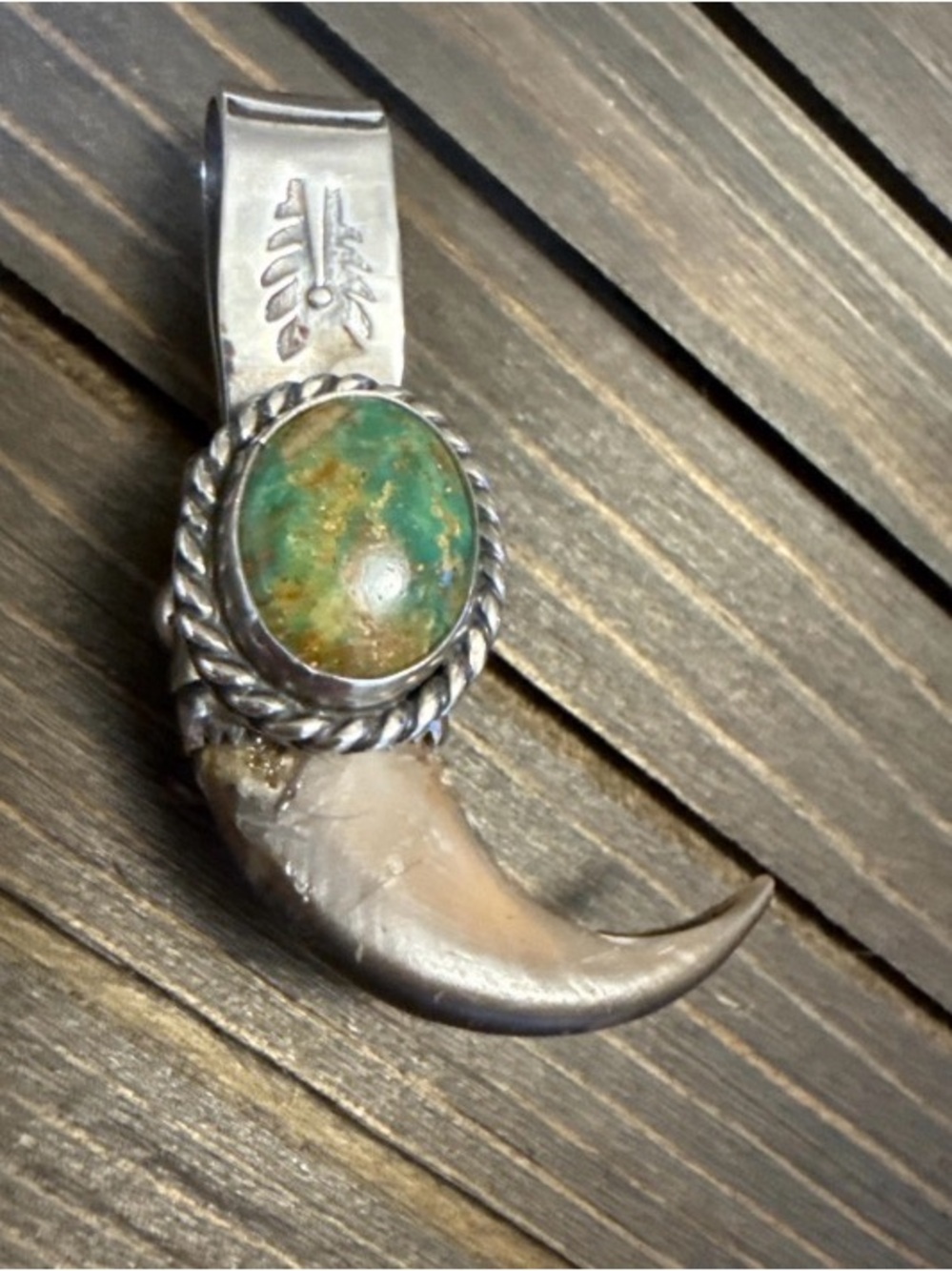 Evans green turquoise and black bear claw pendant